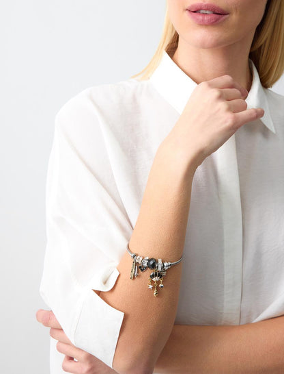Seashell-shaped steel charm bracelet