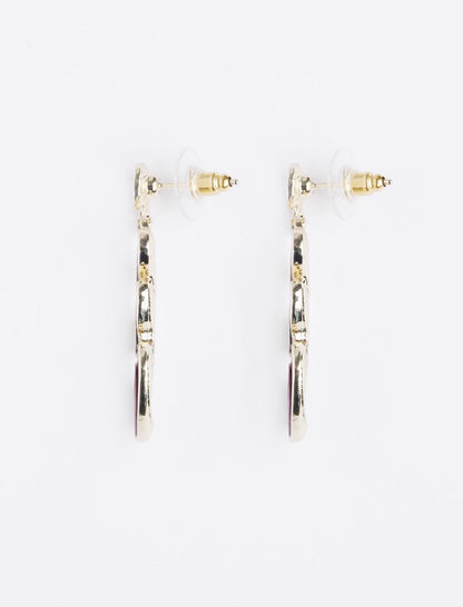 Oval dangling earrings with figures