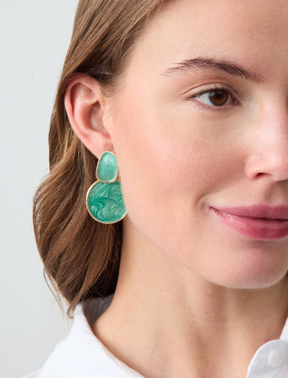 Shiny round earrings with figures