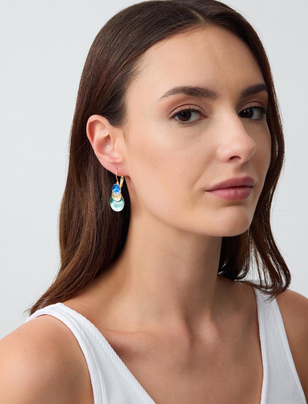 Triple round earrings with figures